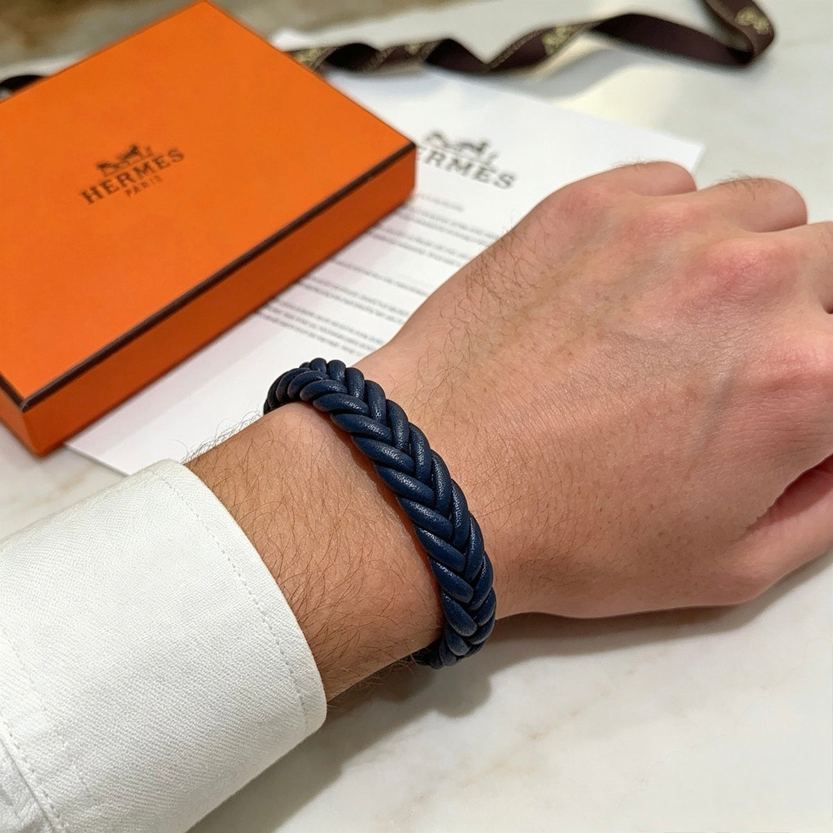 Martin Graham bangle in polished metal-tone – styled product view