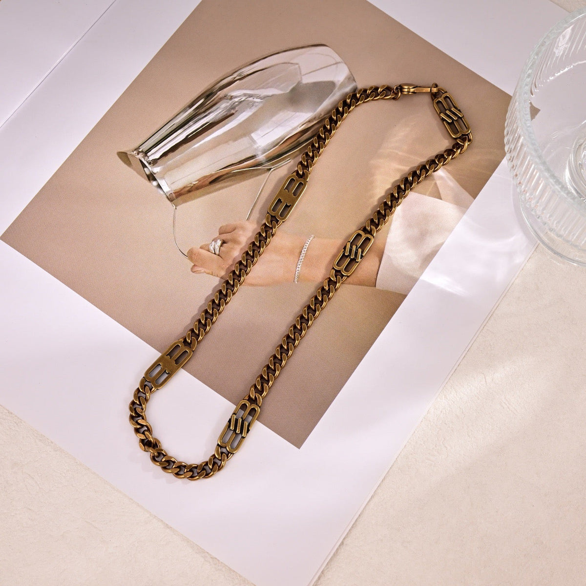 Martin Graham pendant necklace in polished metal-tone – detail view
