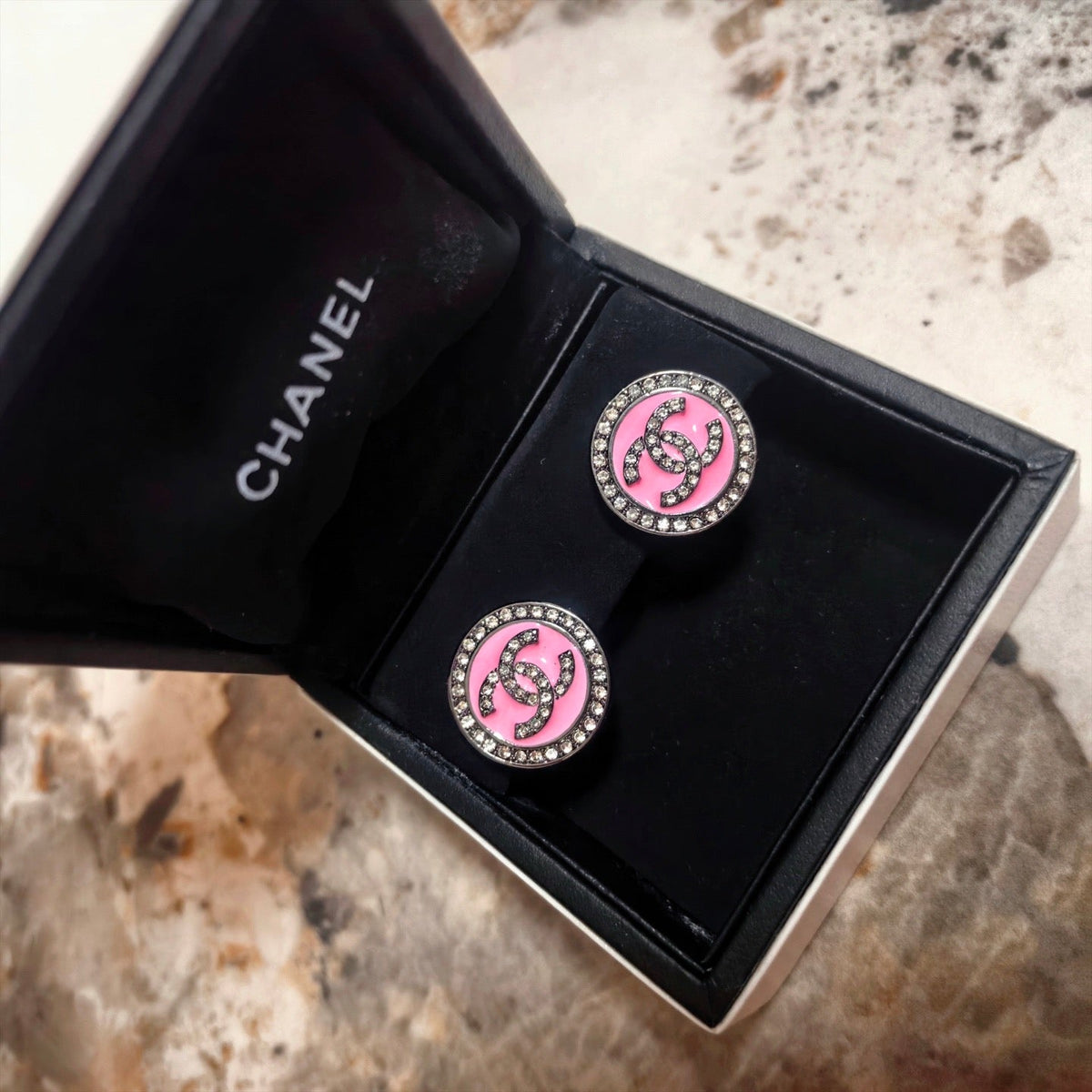 Martin Graham stud earrings in polished metal-tone – detail view