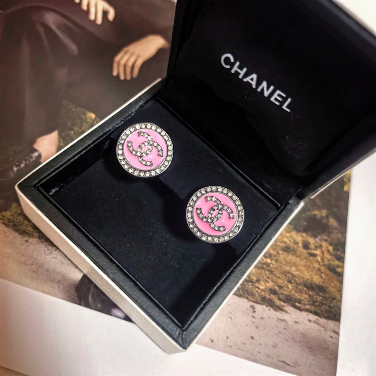 Martin Graham stud earrings in polished metal-tone – close-up detail