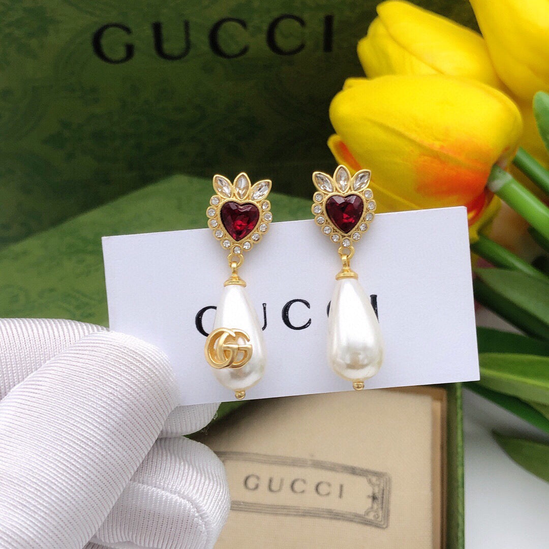 Martin Graham earrings in polished metal-tone – front product view