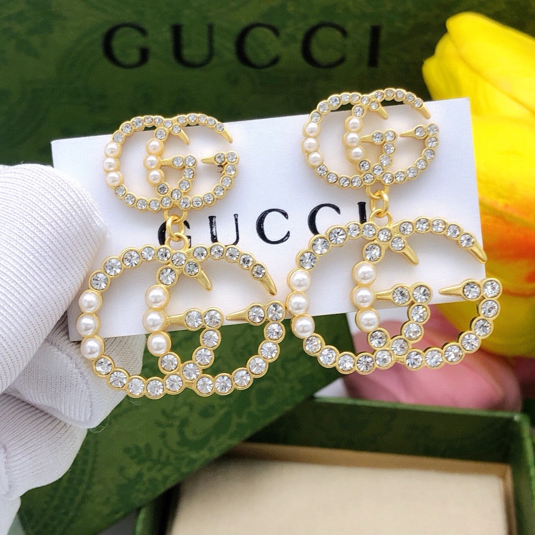 Martin Graham stud earrings in polished metal-tone – main product view