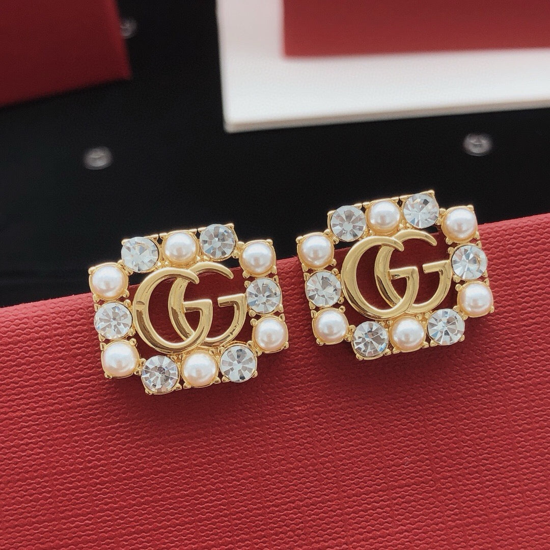 Martin Graham stud earrings in polished metal-tone – main product view