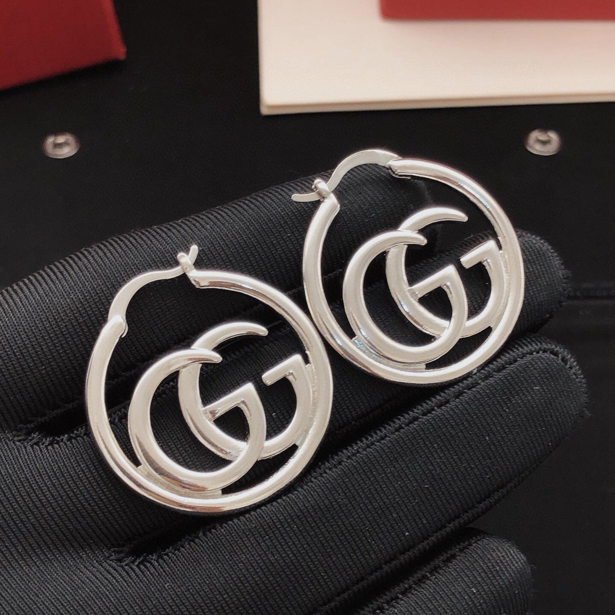 Martin Graham stud earrings in polished metal-tone – main product view