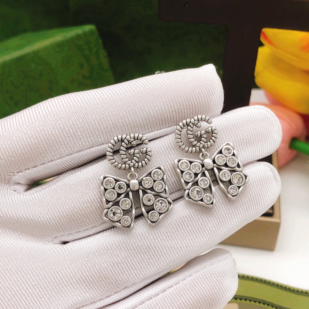 Martin Graham earrings in polished metal-tone – styled product view