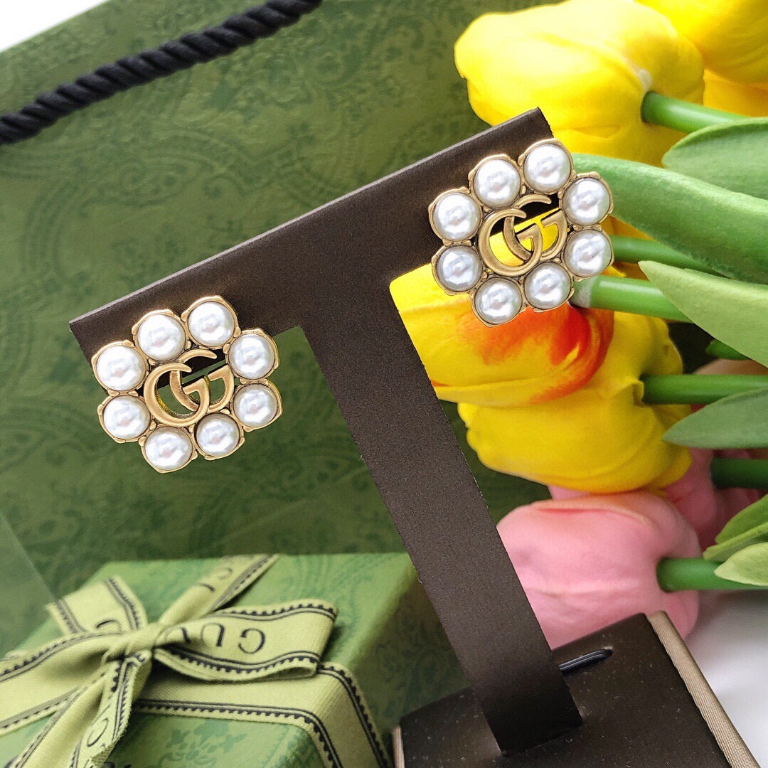 Martin Graham stud earrings in polished metal-tone – main product view