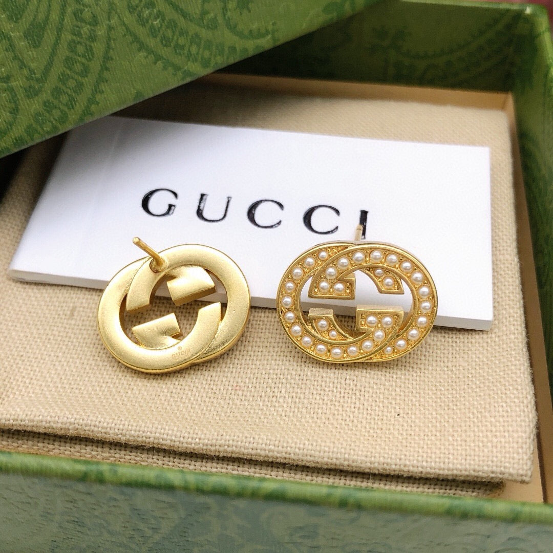 Martin Graham stud earrings in polished metal-tone – main product view