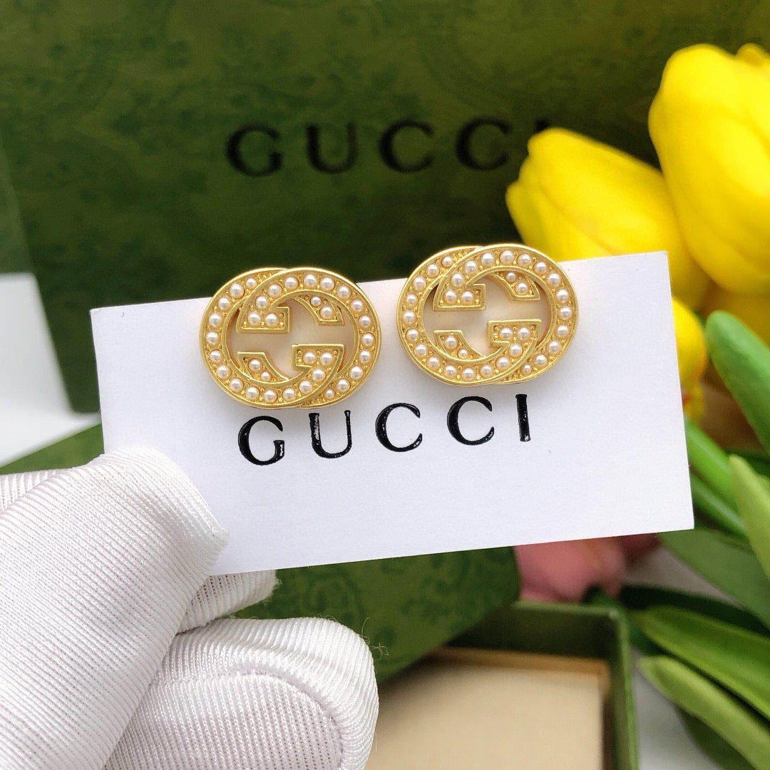 Martin Graham stud earrings in polished metal-tone – main product view