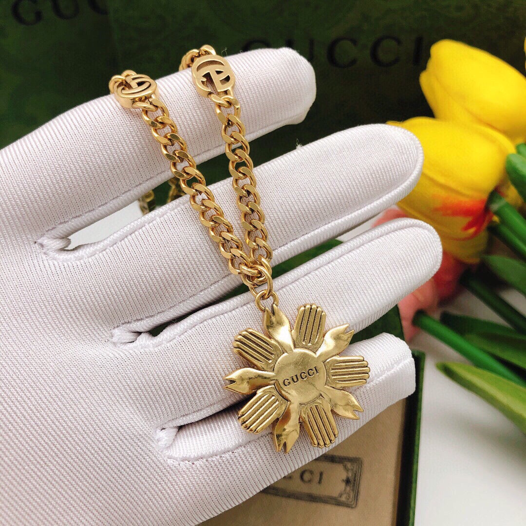 Martin Graham pendant necklace in polished metal-tone – front product view