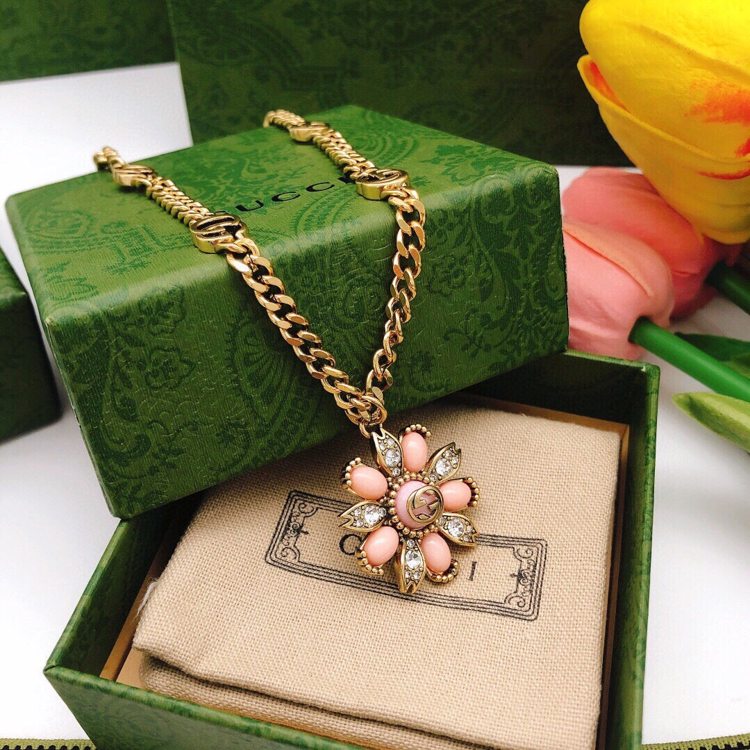 Martin Graham pendant necklace in polished metal-tone – side detail