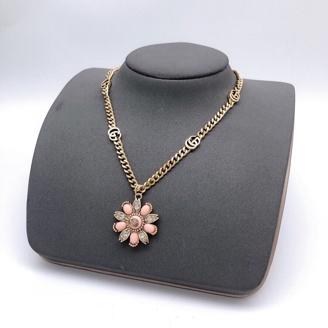 Martin Graham pendant necklace in polished metal-tone – close-up detail