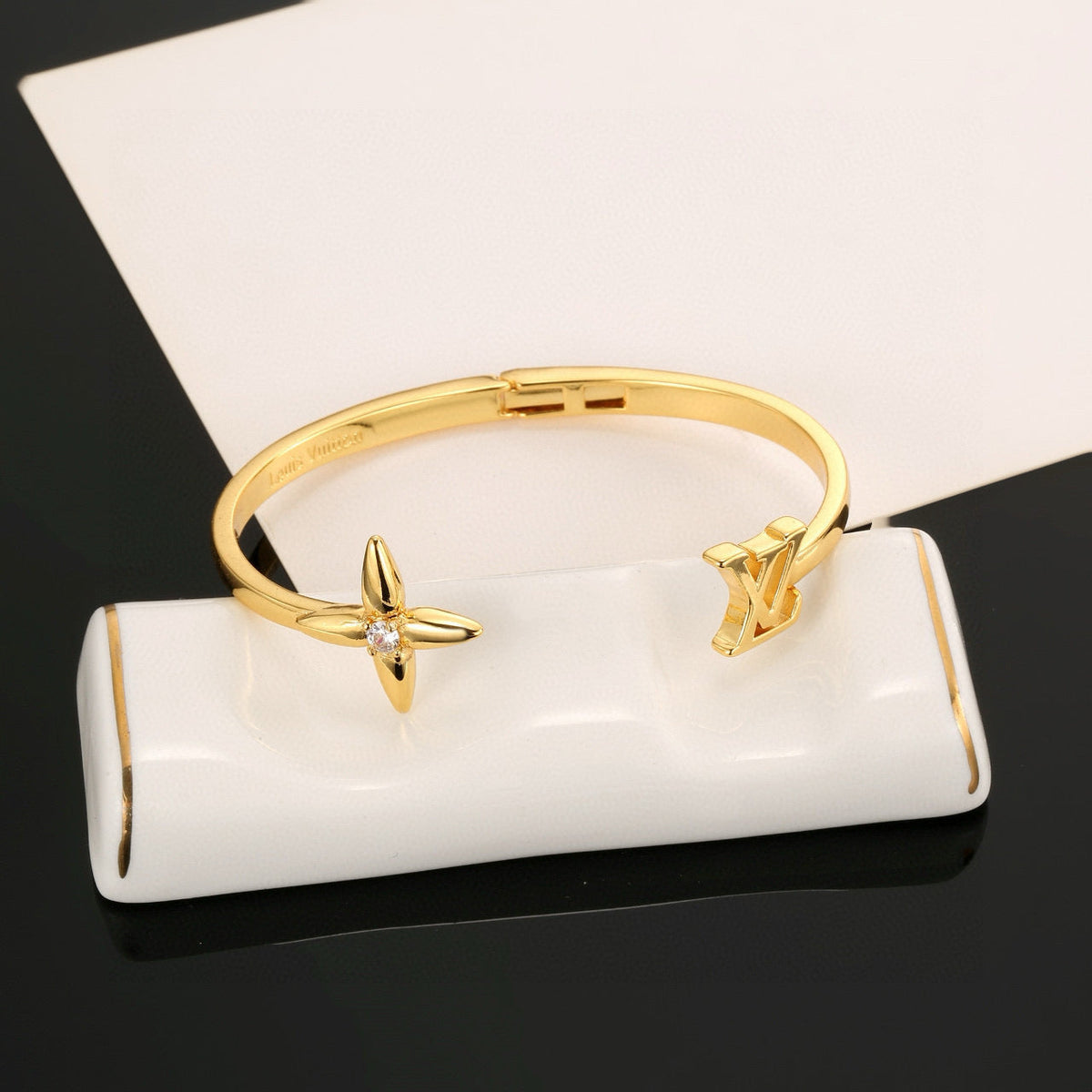Martin Graham bangle in polished metal-tone – front product view