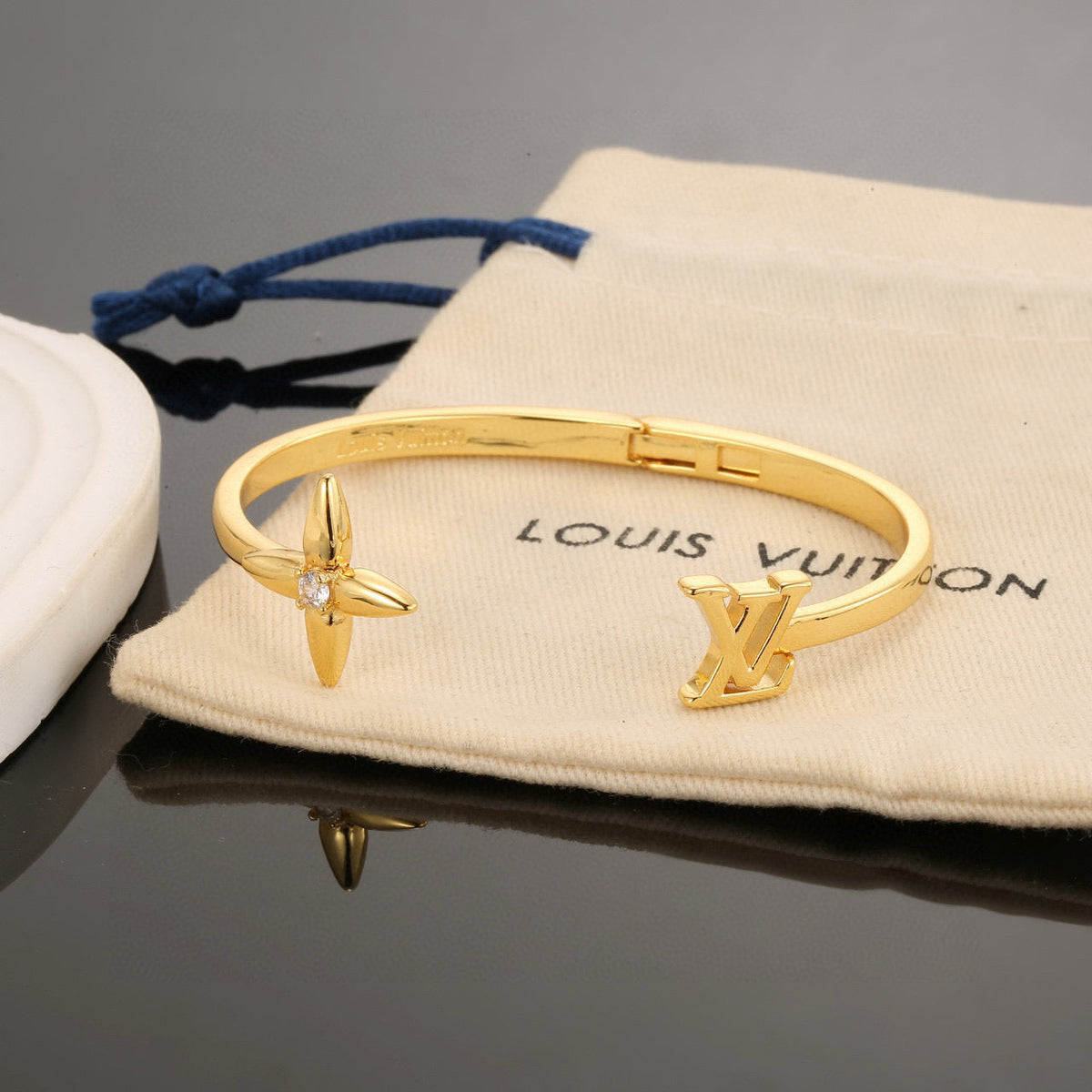 Martin Graham bangle in polished metal-tone – close-up detail