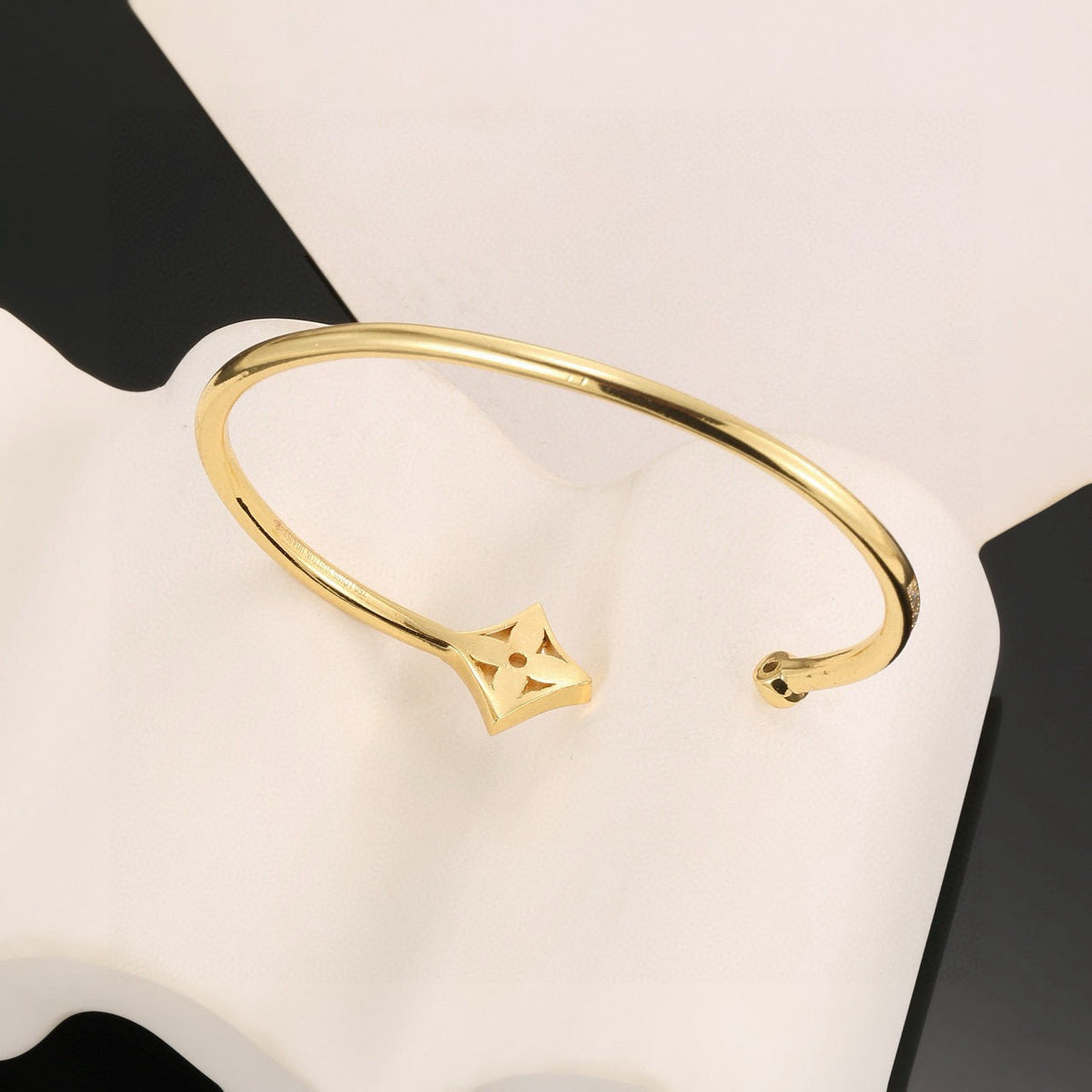 Martin Graham bangle in polished metal-tone – close-up detail