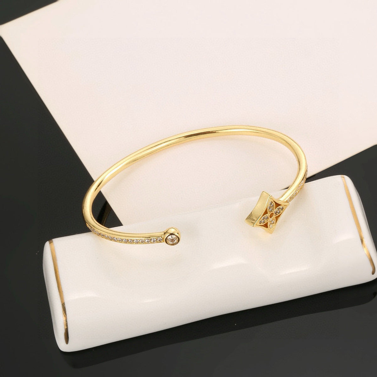 Martin Graham bangle in polished metal-tone – detail view
