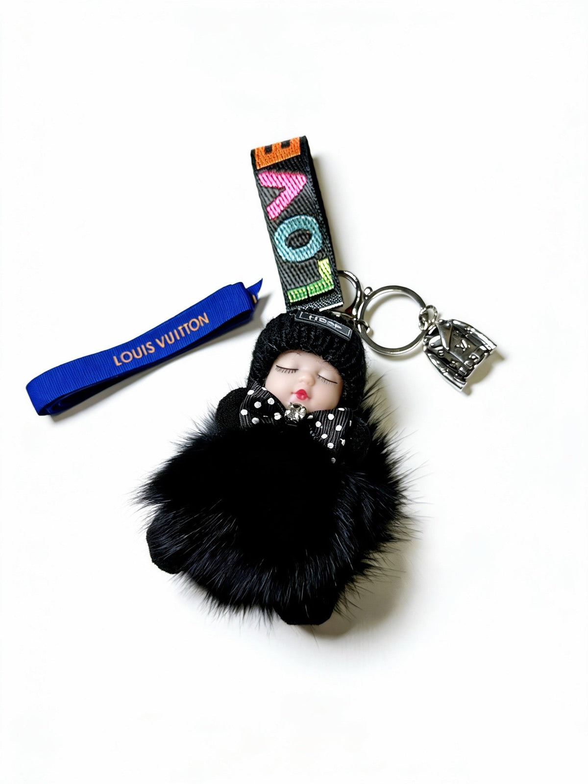 Martin Graham keychain in polished metal-tone – close-up detail