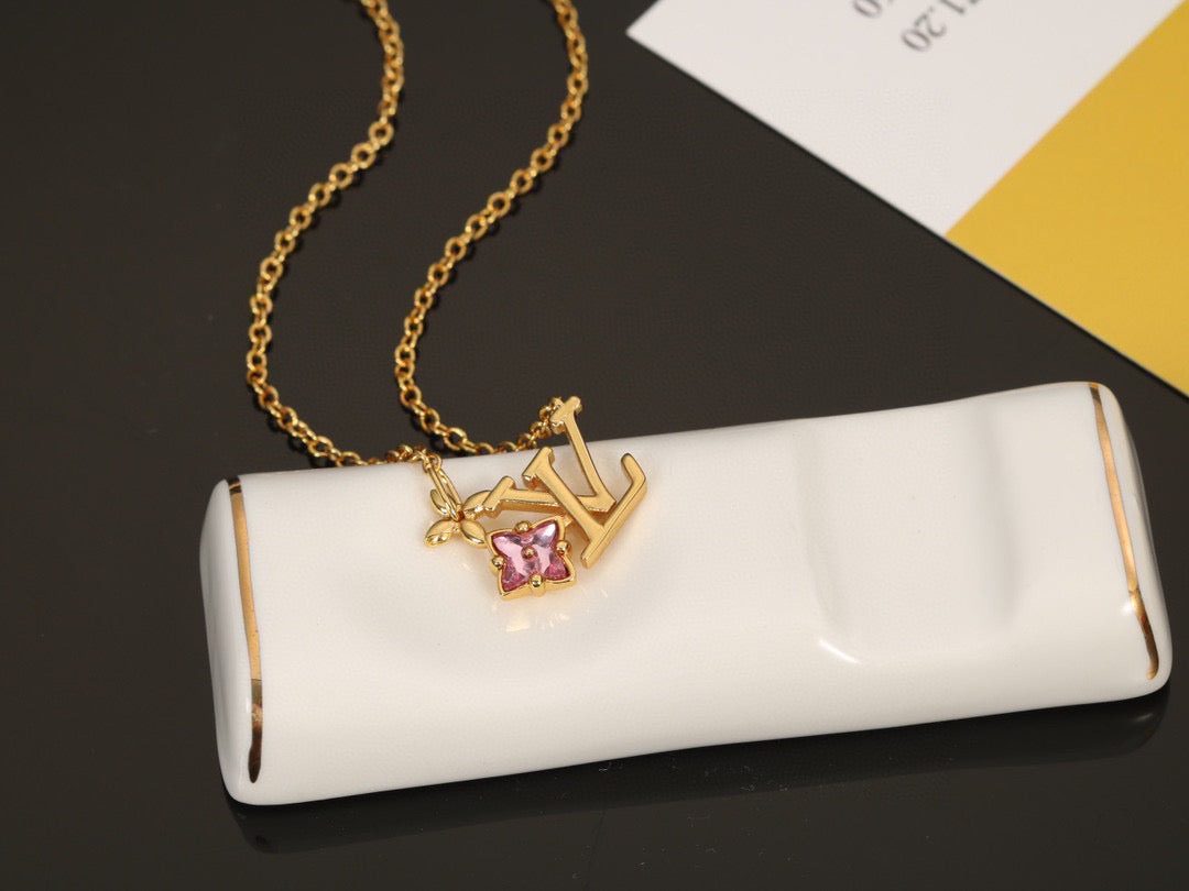 Martin Graham pendant necklace in polished metal-tone – side detail