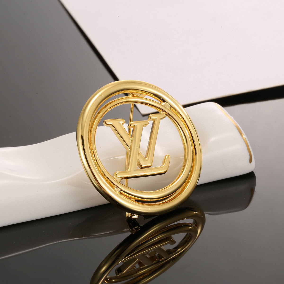Martin Graham brooch in polished metal-tone – front product view