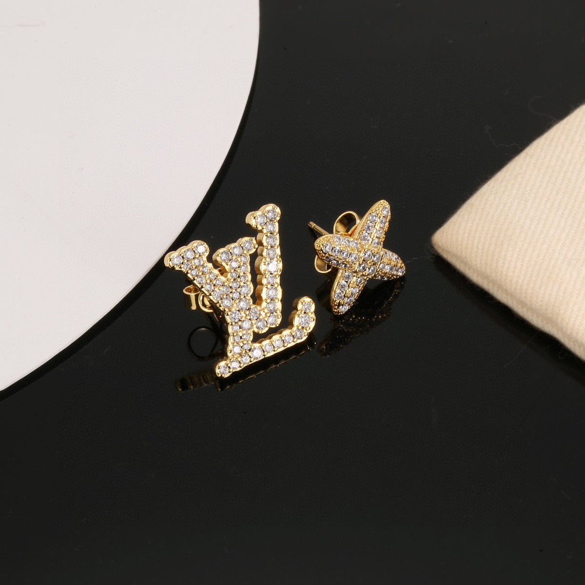 Martin Graham stud earrings in polished metal-tone – main product view