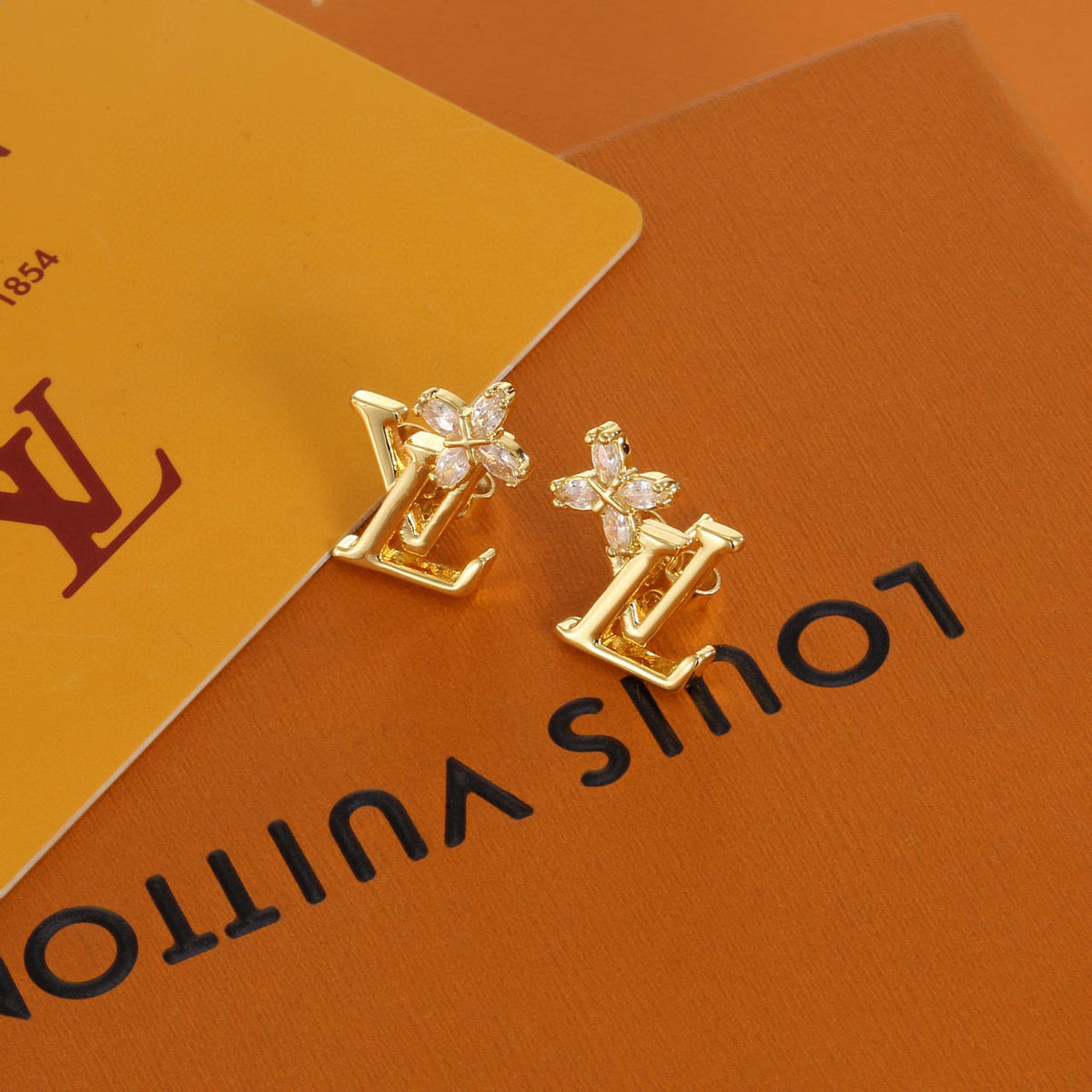 Martin Graham stud earrings in polished metal-tone – main product view