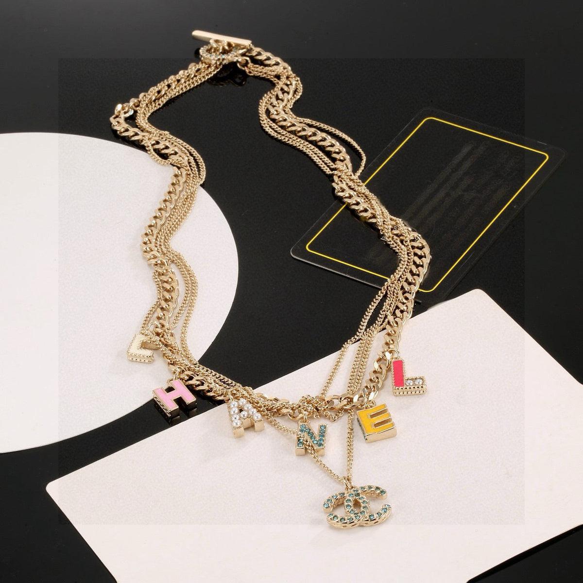 Martin Graham pendant necklace in polished metal-tone – detail view