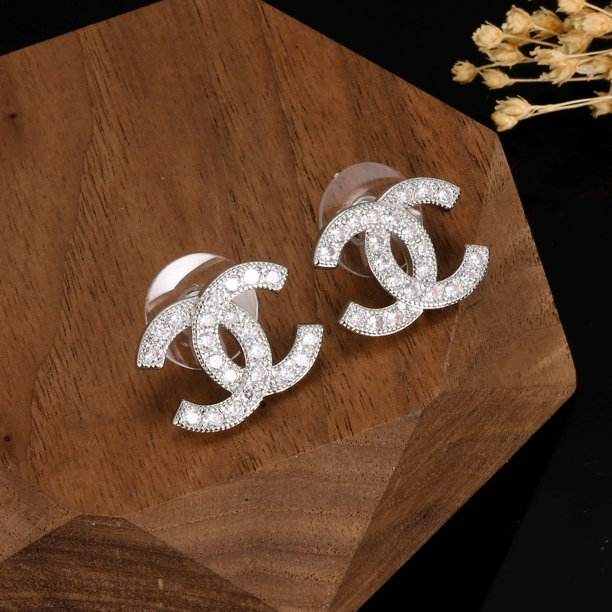 Martin Graham stud earrings in polished metal-tone – front product view