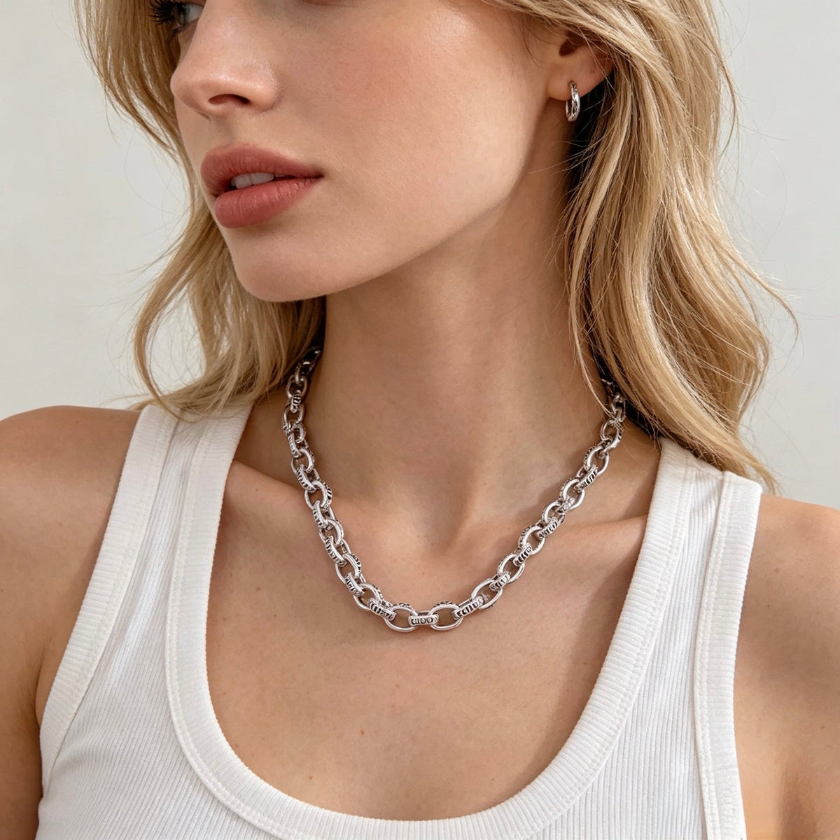 Martin Graham pendant necklace in polished metal-tone – side detail