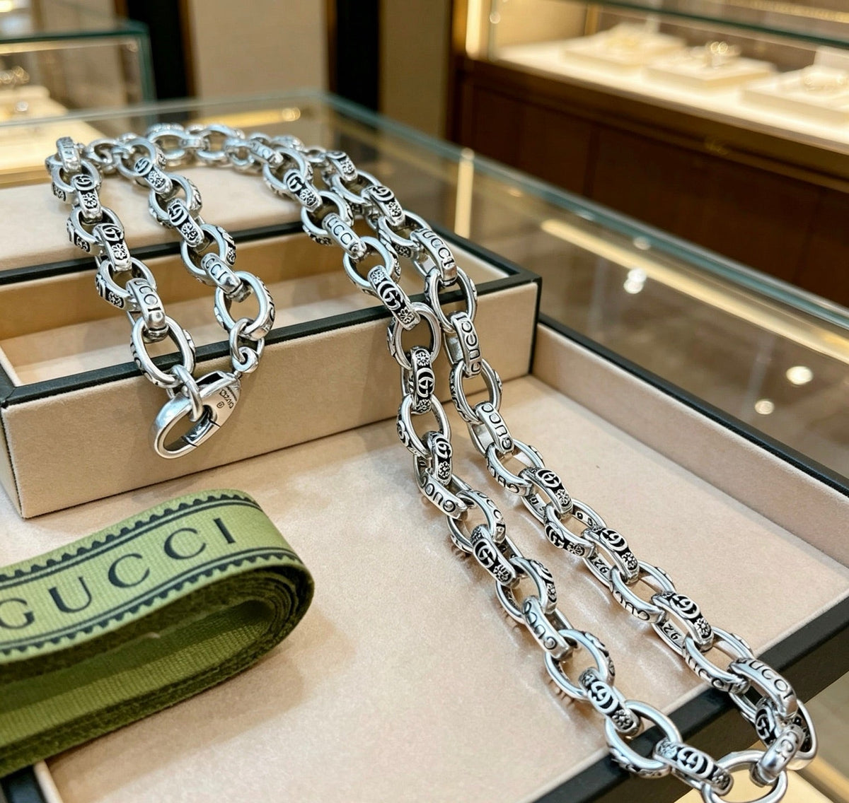 Martin Graham pendant necklace in polished metal-tone – detail view