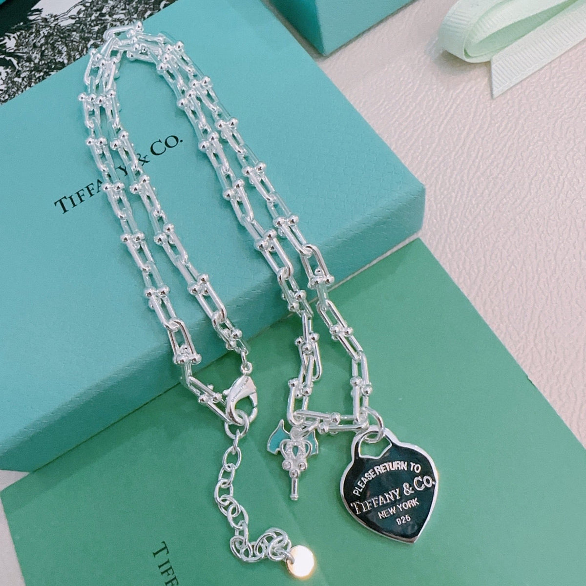 Martin Graham pendant necklace in polished metal-tone – styled product view