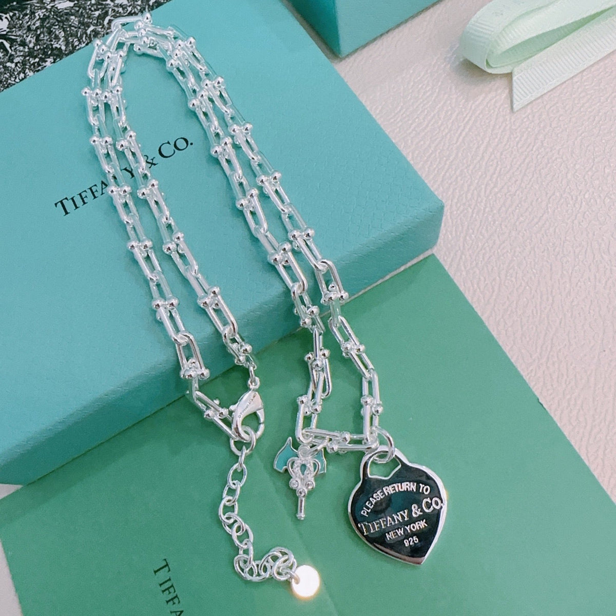 Martin Graham pendant necklace in polished metal-tone – front product view