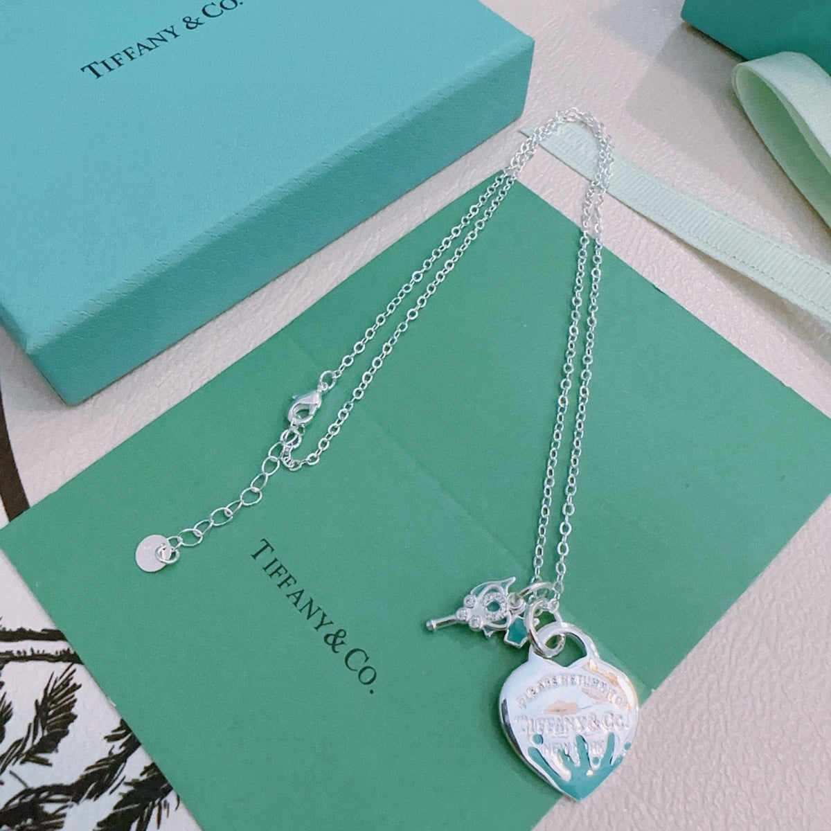 Martin Graham pendant necklace in polished metal-tone – detail view
