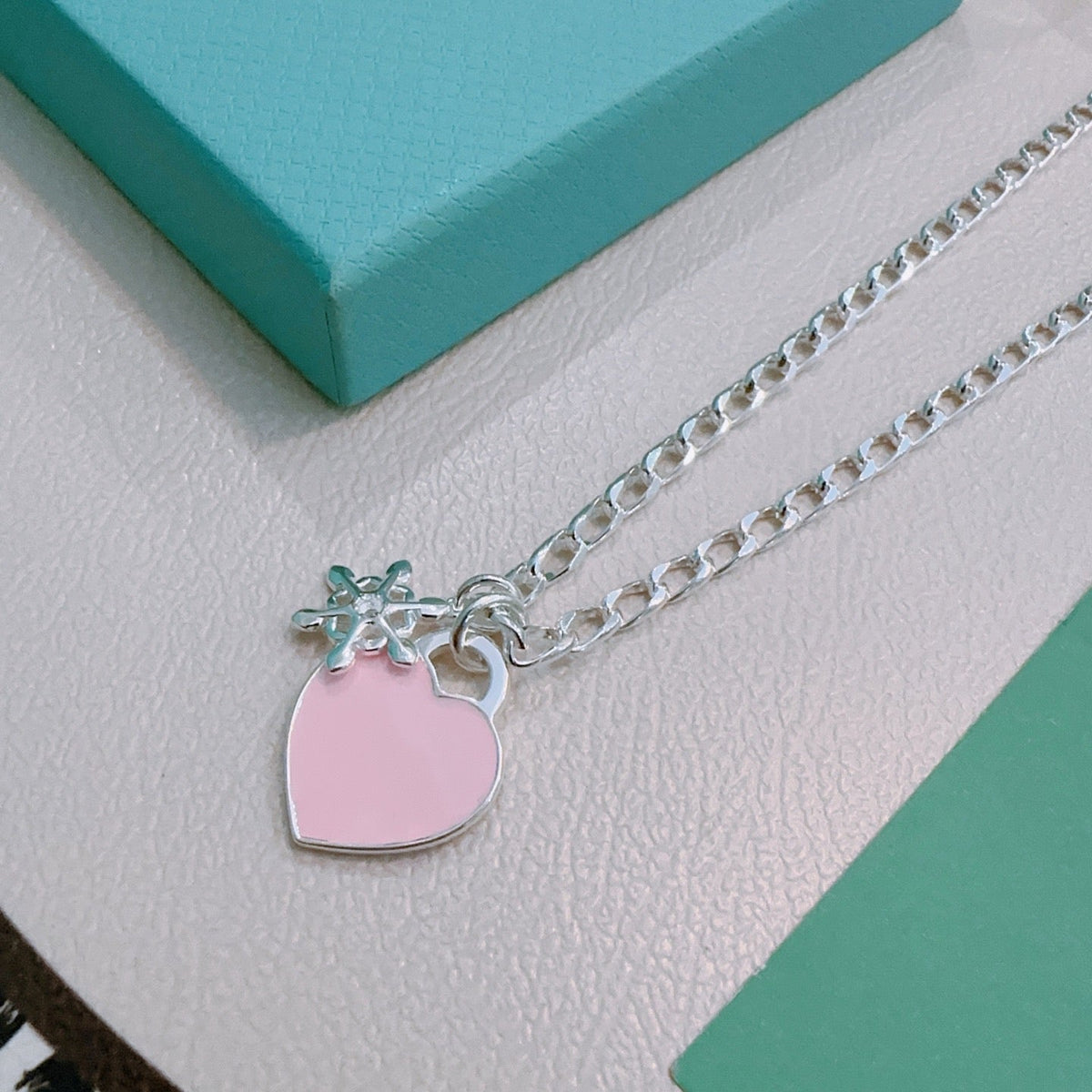 Martin Graham pendant necklace in polished metal-tone – close-up detail