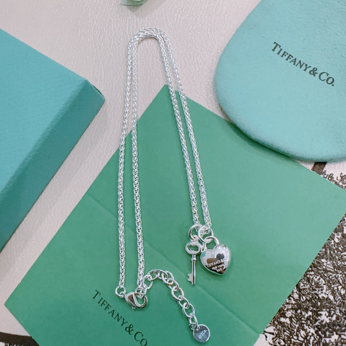 Martin Graham pendant necklace in polished metal-tone – detail view