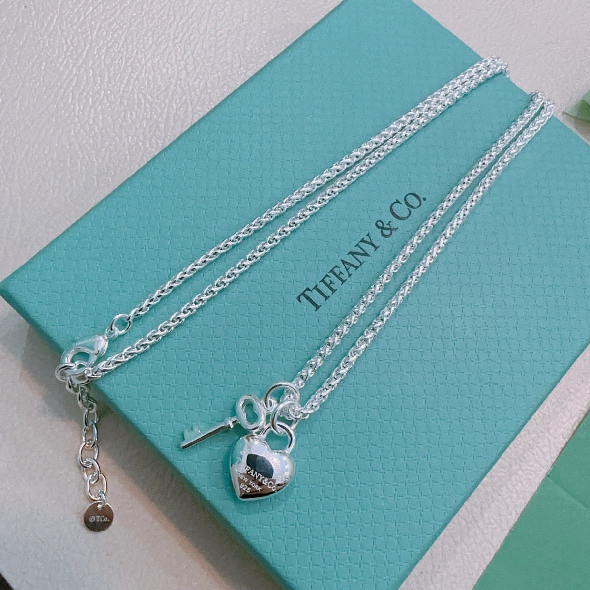 Martin Graham pendant necklace in polished metal-tone – styled product view