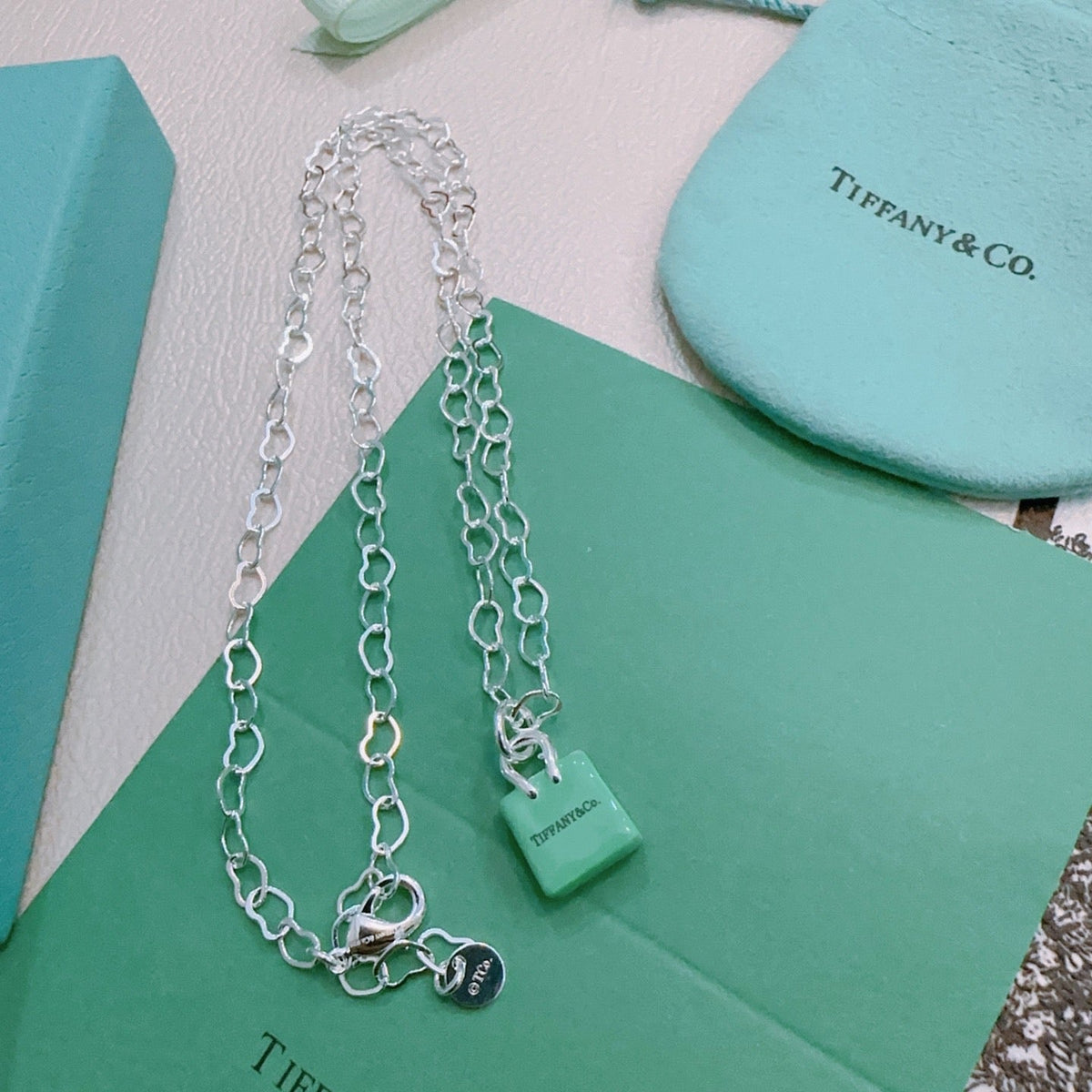 Martin Graham pendant necklace in polished metal-tone – styled product view