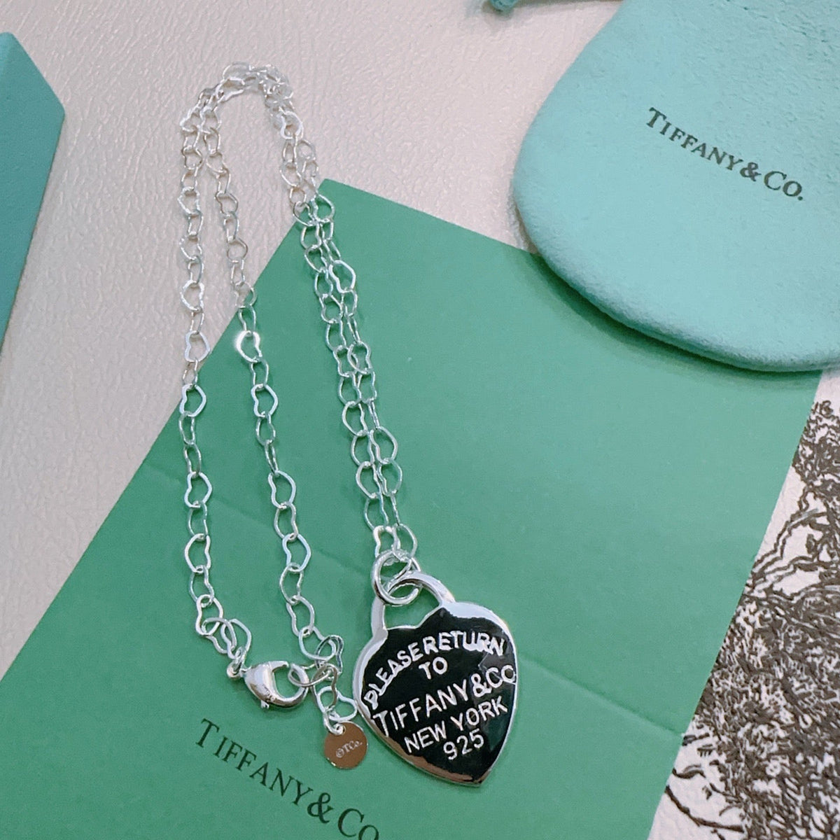 Martin Graham pendant necklace in polished metal-tone – detail view
