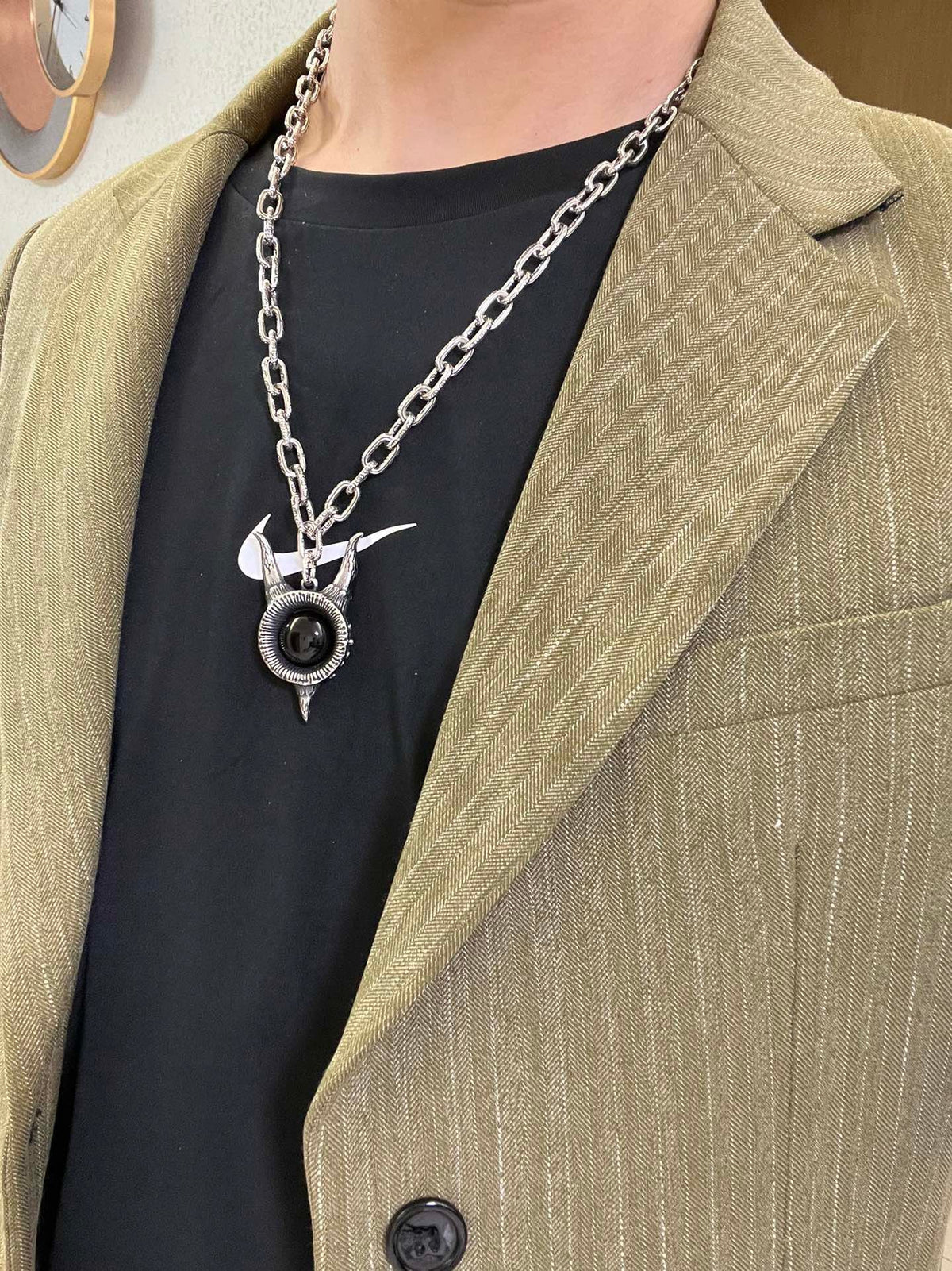 Martin Graham pendant necklace in polished metal-tone – detail view
