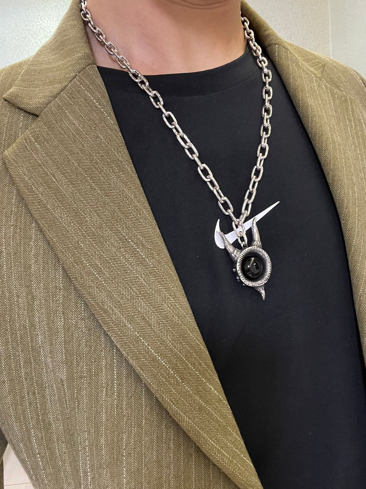 Martin Graham pendant necklace in polished metal-tone – detail view