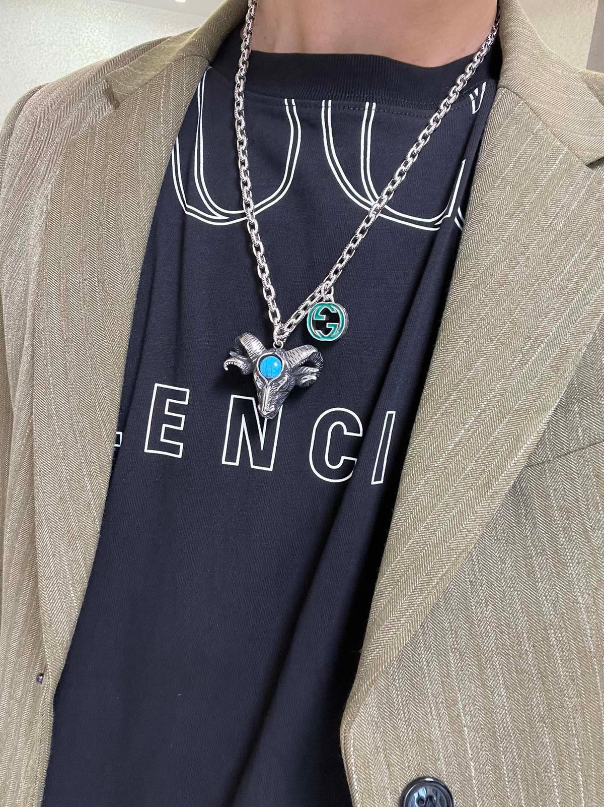 Martin Graham pendant necklace in polished metal-tone – detail view