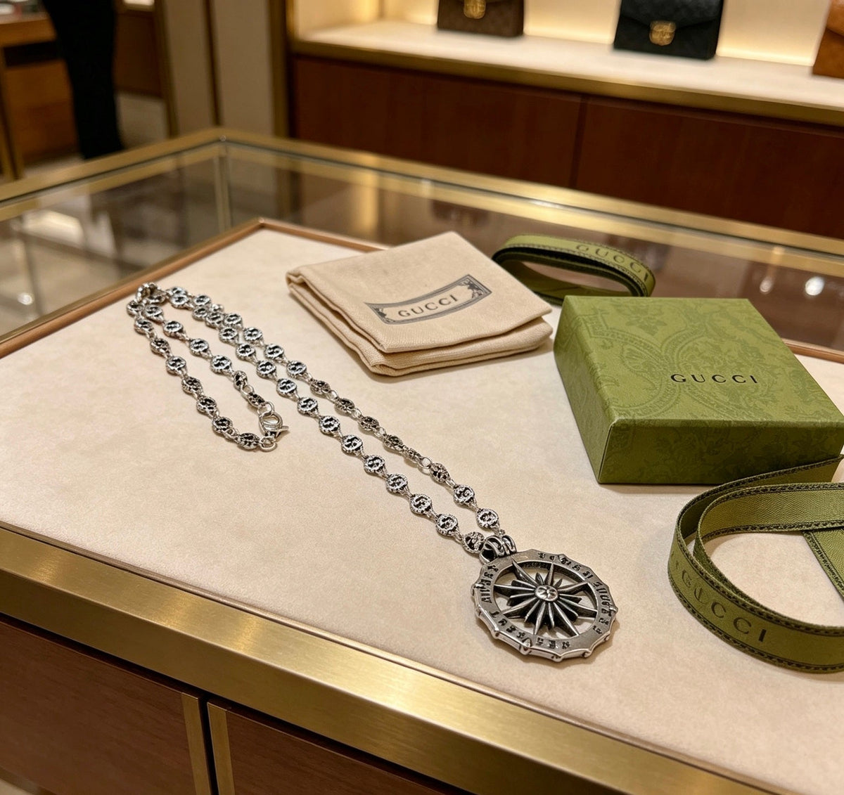 Martin Graham pendant necklace in polished metal-tone – front product view