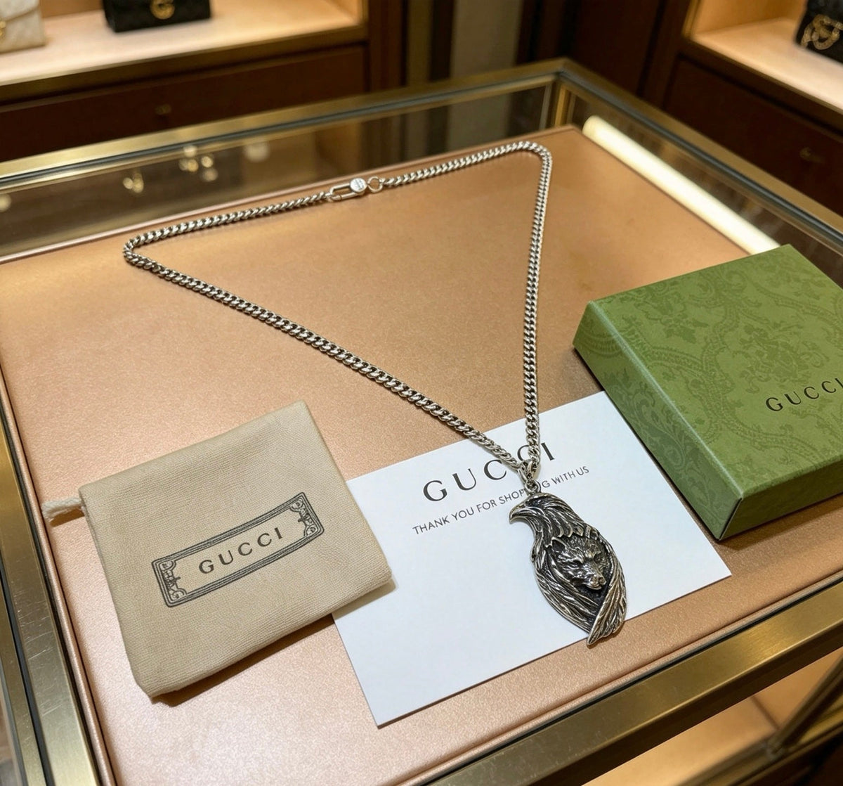 Martin Graham pendant necklace in polished metal-tone – side detail