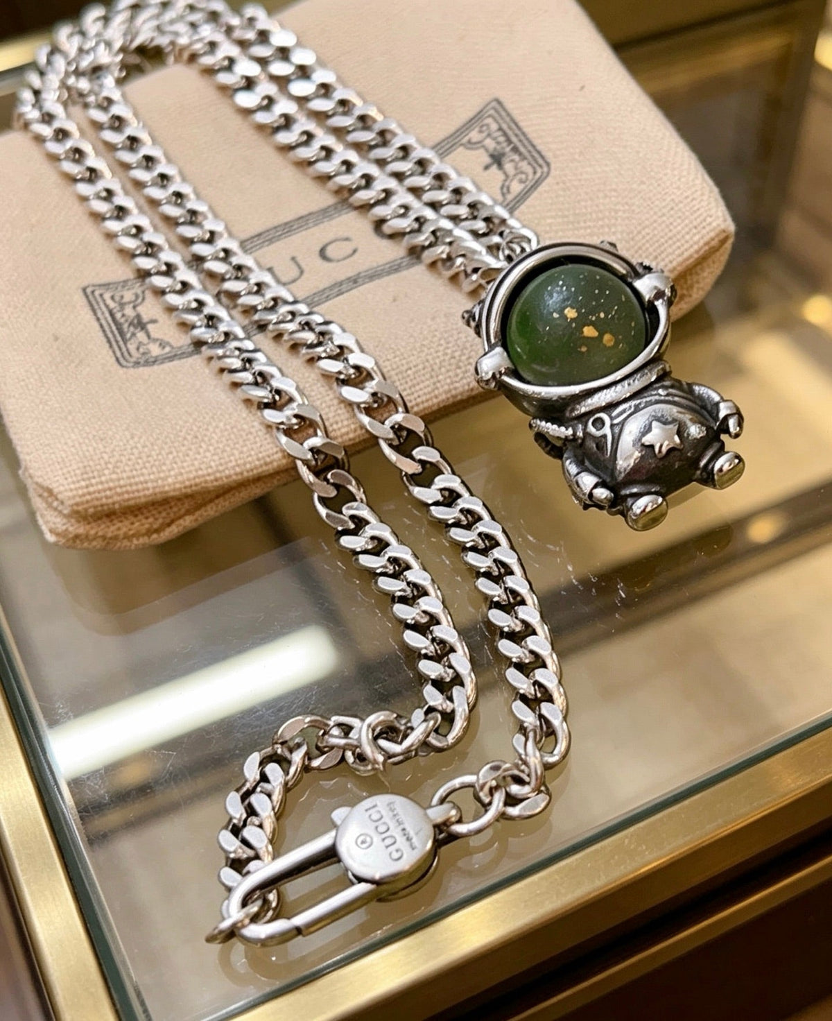 Martin Graham pendant necklace in polished metal-tone – detail view