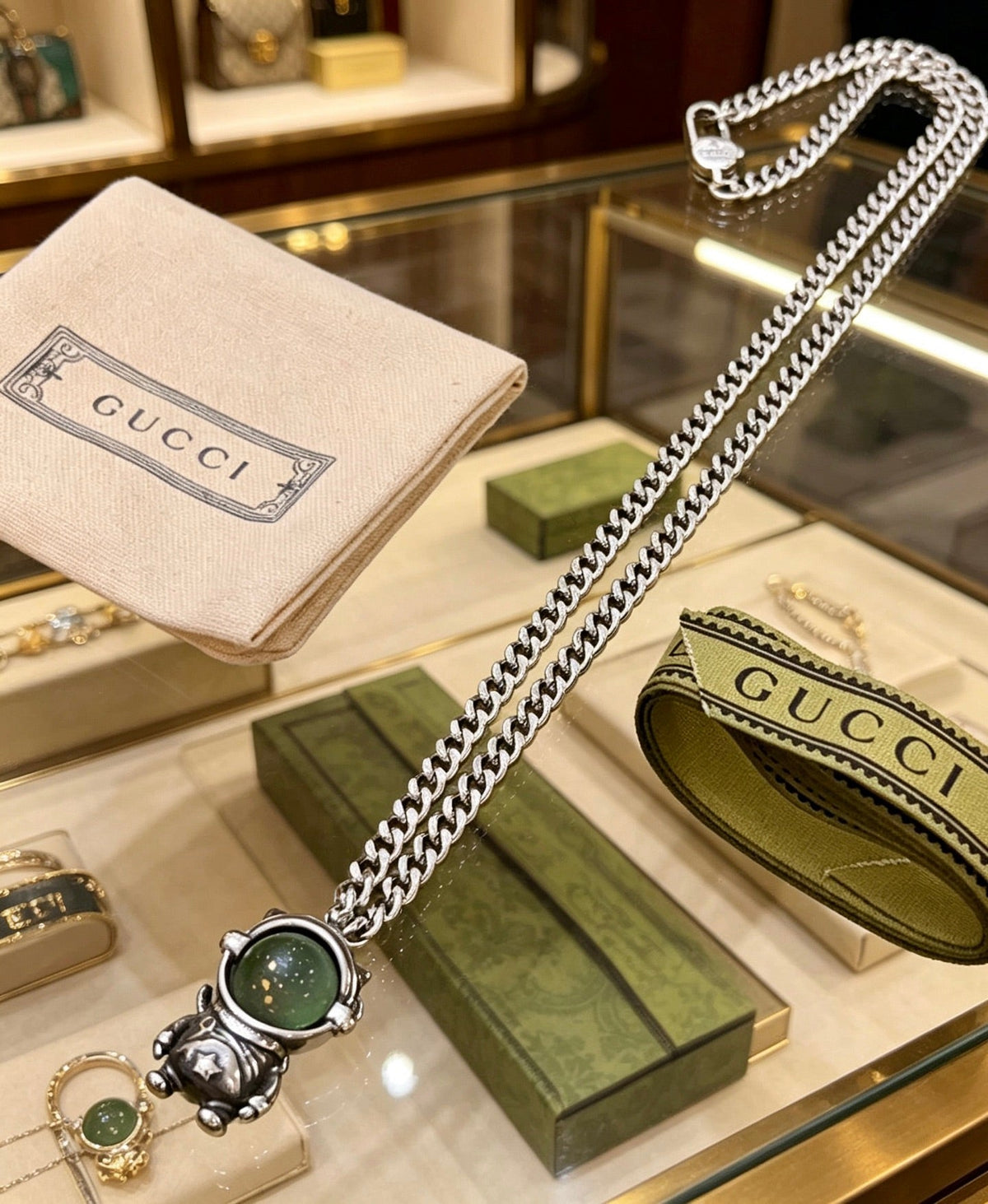 Martin Graham pendant necklace in polished metal-tone – close-up detail