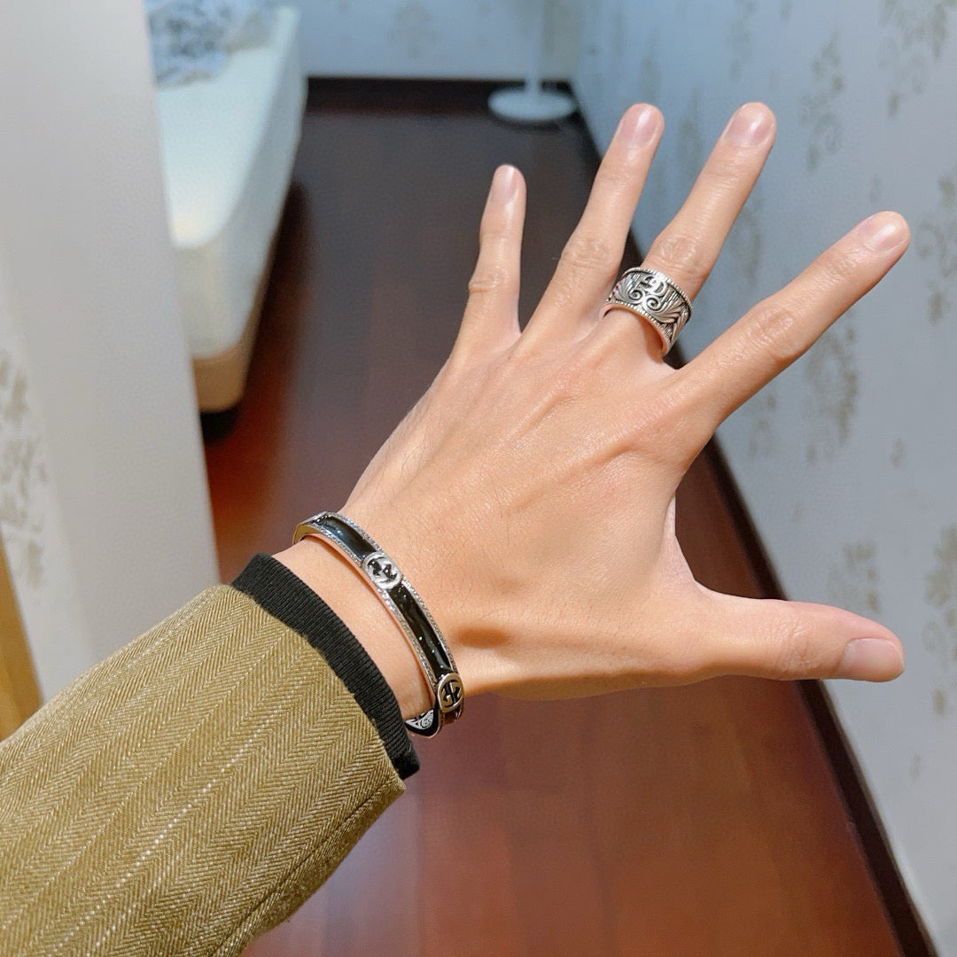 Martin Graham bangle in polished metal-tone – front product view