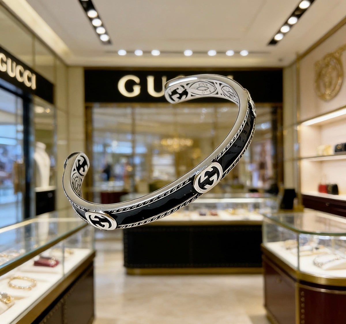 Martin Graham bangle in polished metal-tone – front product view