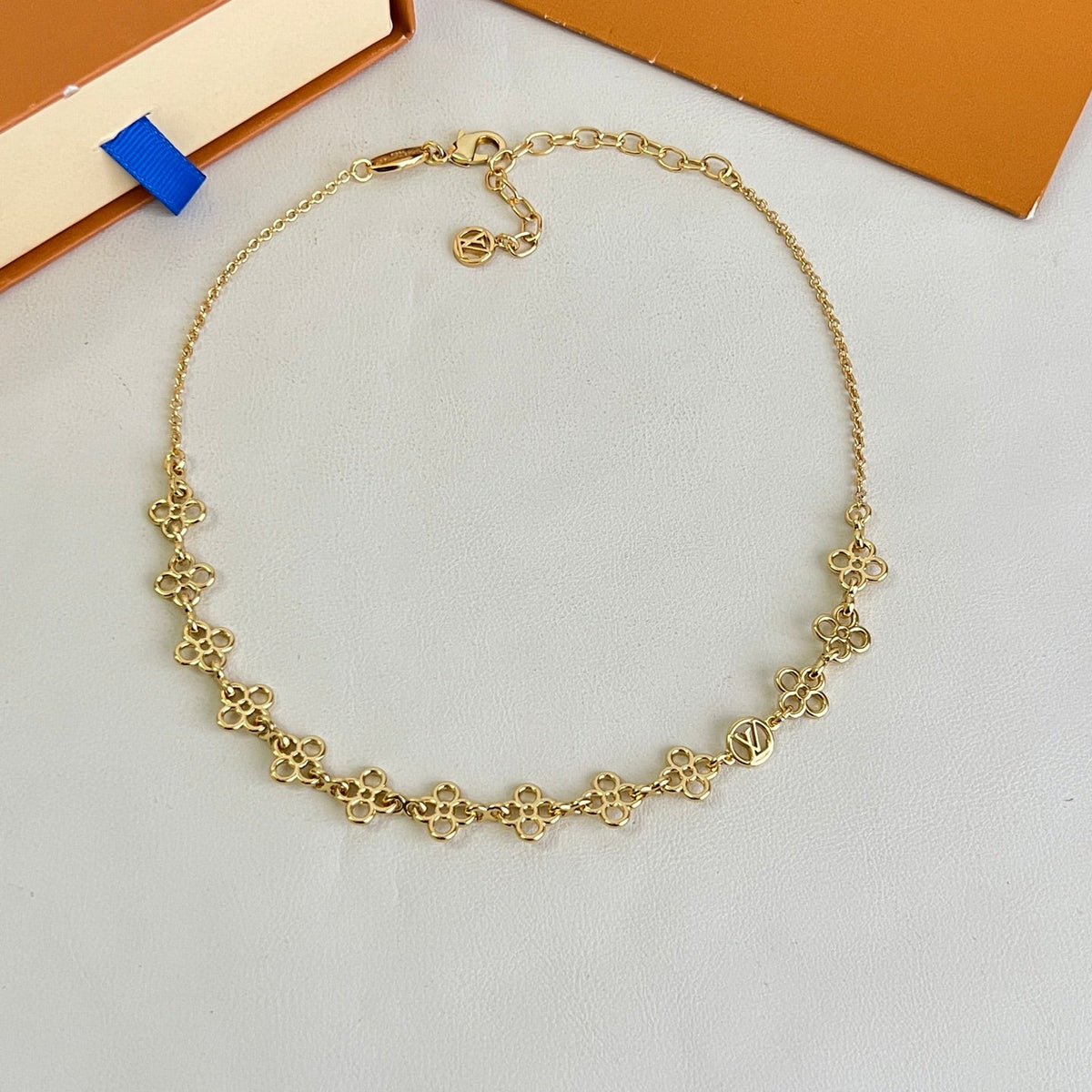 Martin Graham pendant necklace in polished metal-tone – close-up detail