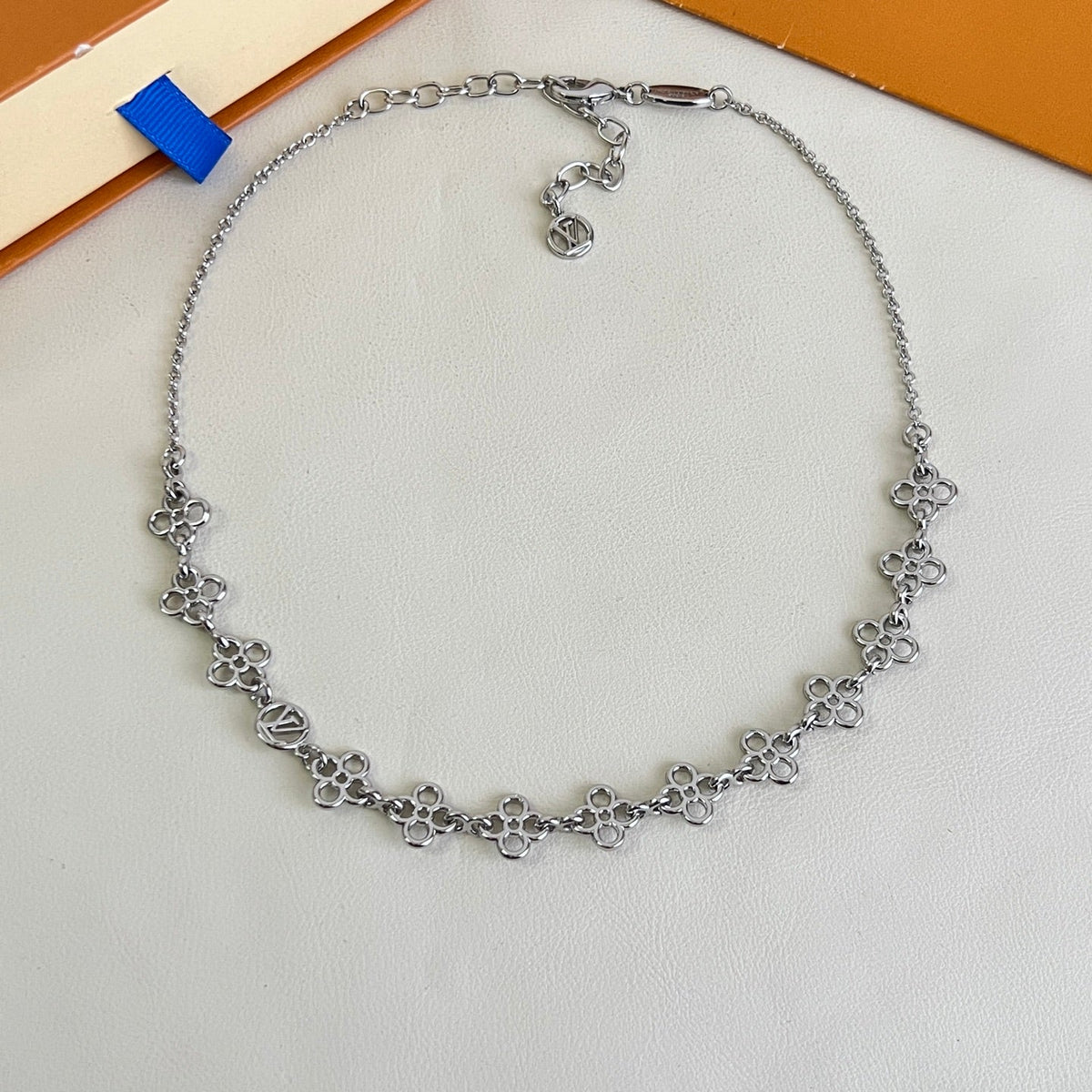 Martin Graham pendant necklace in polished metal-tone – close-up detail