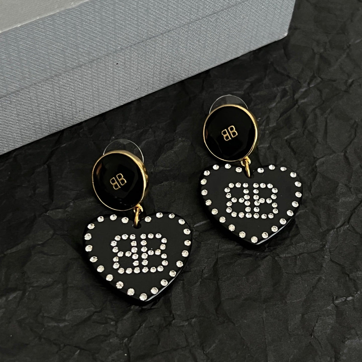 Martin Graham earrings in polished metal-tone – detail view