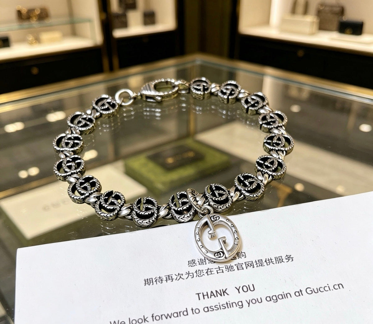 Martin Graham bracelet in polished metal-tone – close-up detail