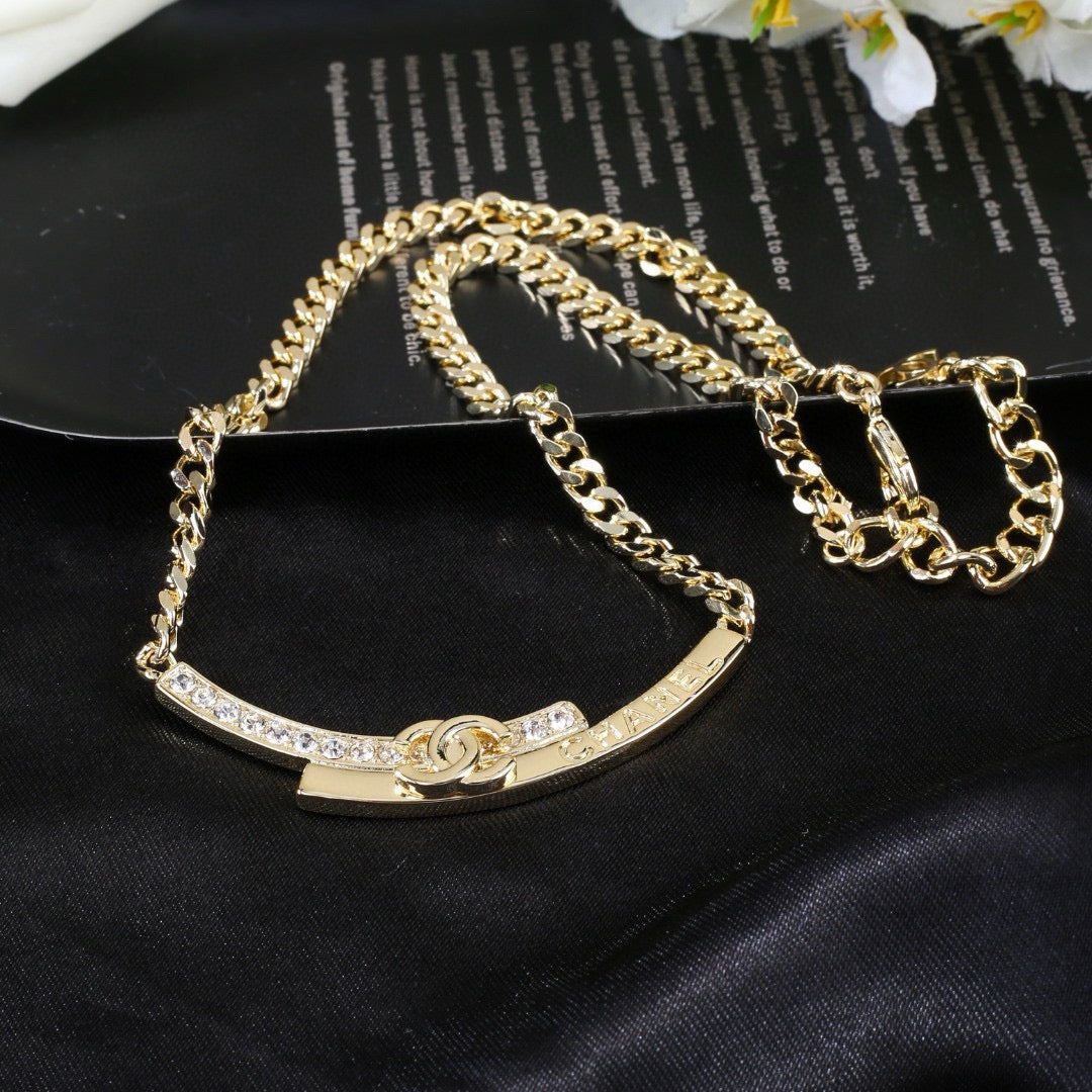 Martin Graham pendant necklace in polished metal-tone – detail view